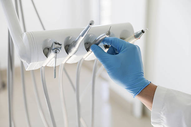 Professional Invisalign Clear Aligners technician working in Rockwall, TX